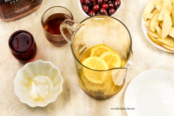 Holiday Cranberry Sangria Recipe. Need a fantastic sangria recipe for a holiday get-together or party? This holiday cranberry sangria recipe is light and refreshing yet packed with flavor and oh so easy to make! It is the best sangria recipe for holiday celebrations; a real crowd-pleaser.