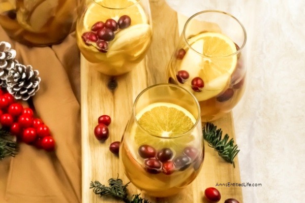 Holiday Cranberry Sangria Recipe. Need a fantastic sangria recipe for a holiday get-together or party? This holiday cranberry sangria recipe is light and refreshing yet packed with flavor and oh so easy to make! It is the best sangria recipe for holiday celebrations; a real crowd-pleaser.