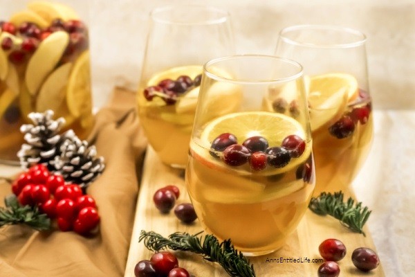 Holiday Cranberry Sangria Recipe. Need a fantastic sangria recipe for a holiday get-together or party? This holiday cranberry sangria recipe is light and refreshing yet packed with flavor and oh so easy to make! It is the best sangria recipe for holiday celebrations; a real crowd-pleaser.