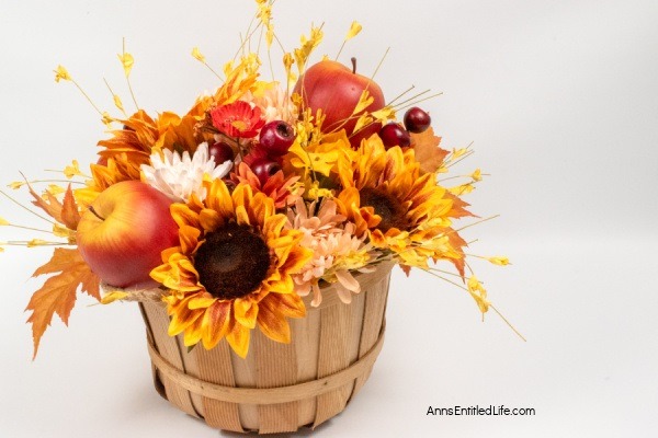 Rustic Fall Centerpiece. This beautiful fall table centerpiece is a must-make for those who like farmhouse decor! If you are looking for a seasonal centerpiece, make this easy rustic fall centerpiece by following these step-by-step instructions.