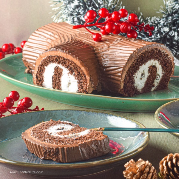 Yule Log Cake Recipe. Yule log cake is also known as Bûche De Noël in French. It is a delicious chocolate sponge cake filled with vanilla whipped cream and covered with chocolate ganache. Yule cake is a traditional Christmas cake that is decorated to resemble a log. This classic Christmas dessert is definitely a showstopper. It not only looks amazing but also it tastes absolutely divine.