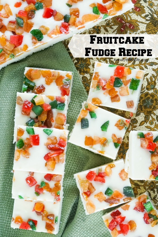 scattered pieces of fruitcake fudge againsta green cloth