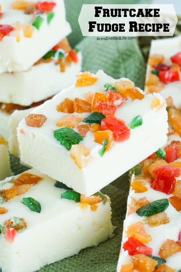 An upclose side view of a stack of fruitcake fudge pieces