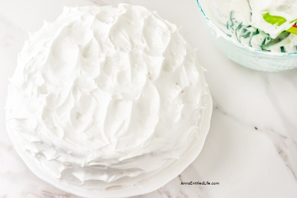 Lemon Meringue Cake Recipe. Layers of lemon cake filled with a lemon curd mixture and topped with a beautiful meringue frosting make for a spectacular presentation. If you like lemon, you will love this delicious lemon meringue cake.