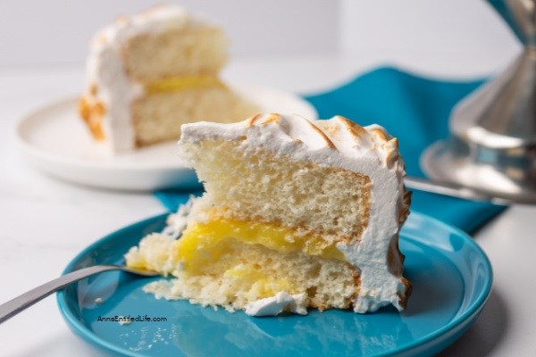 Lemon Meringue Cake Recipe. Layers of lemon cake filled with a lemon curd mixture and topped with a beautiful meringue frosting make for a spectacular presentation. If you like lemon, you will love this delicious lemon meringue cake.