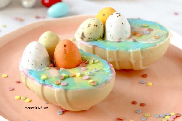 Easter Egg Cheesecake Recipe. A candy Easter egg paired with a smooth and creamy cheesecake filling in this outrageously decadent dessert. If you like the rich and tangy taste of cheesecake, you will love this homemade candy egg stuffed with a luscious cheesecake filling in a pressed crumb and candy shell. These are individually portioned, and since the containers are candy, fully edible.