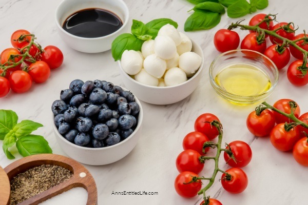 Red, White, and Blue Caprese Salad Recipe. Looking for a festive summertime Caprese salad recipe? Try this red, white, and blue Caprese salad. Made with fresh tomatoes, blueberries, and basil, this updated Caprese salad recipe is perfect for the 4th of July, summertime picnics, or a Memorial Day BBQ.