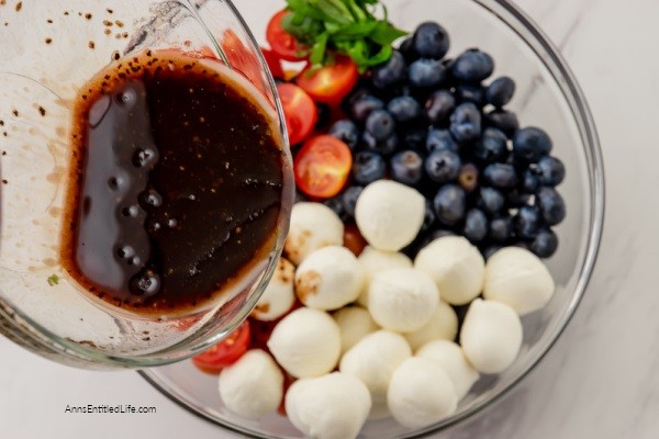 Red, White, and Blue Caprese Salad Recipe. Looking for a festive summertime Caprese salad recipe? Try this red, white, and blue Caprese salad. Made with fresh tomatoes, blueberries, and basil, this updated Caprese salad recipe is perfect for the 4th of July, summertime picnics, or a Memorial Day BBQ.