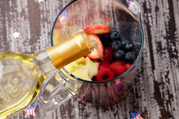 Red, White, and Blue Sangria Recipe. This Red, White, and Blue Sangria is simple to make. Bursting with juicy fruits and delicious flavors it is the perfect drink to celebrate Independence Day, Memorial Day, or any summer holiday.