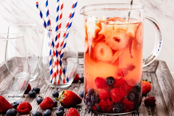 Red, White, and Blue Sangria Recipe. This Red, White, and Blue Sangria is simple to make. Bursting with juicy fruits and delicious flavors it is the perfect drink to celebrate Independence Day, Memorial Day, or any summer holiday.