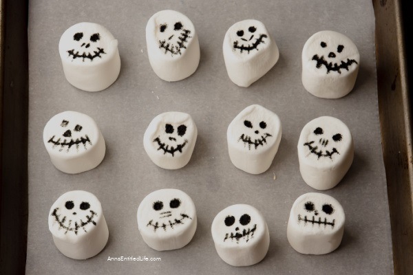 Homemade Halloween Skeleton Cupcake Toppers. Homemade Halloween skeleton toppers are an easy-to-make treat the whole family will enjoy. These kid-friendly Halloween cupcakes are delightful and just a little bit spooky. They are perfect for your Halloween table, lunch boxes, or a Halloween party.