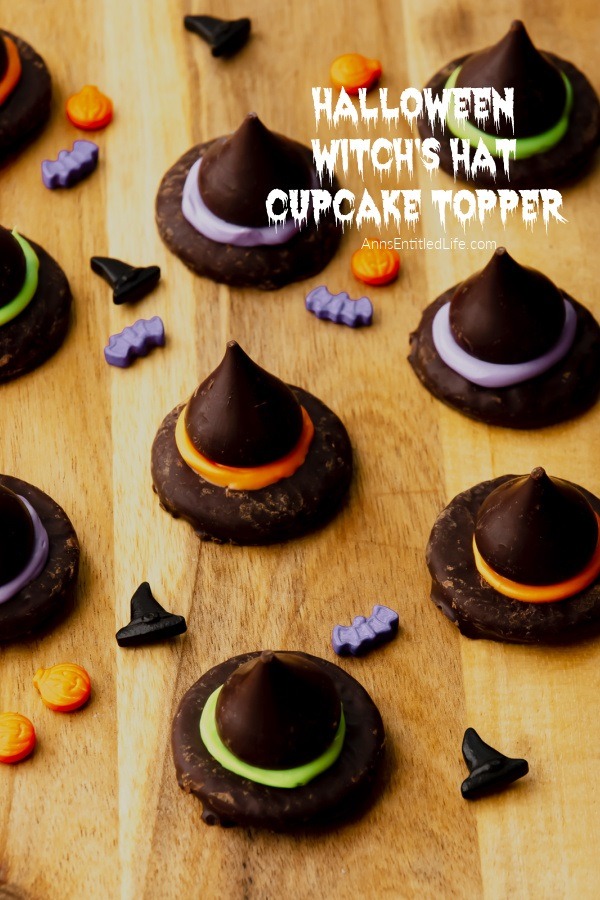 Overhead view of nine Halloween witch's hat topper on a butcher block