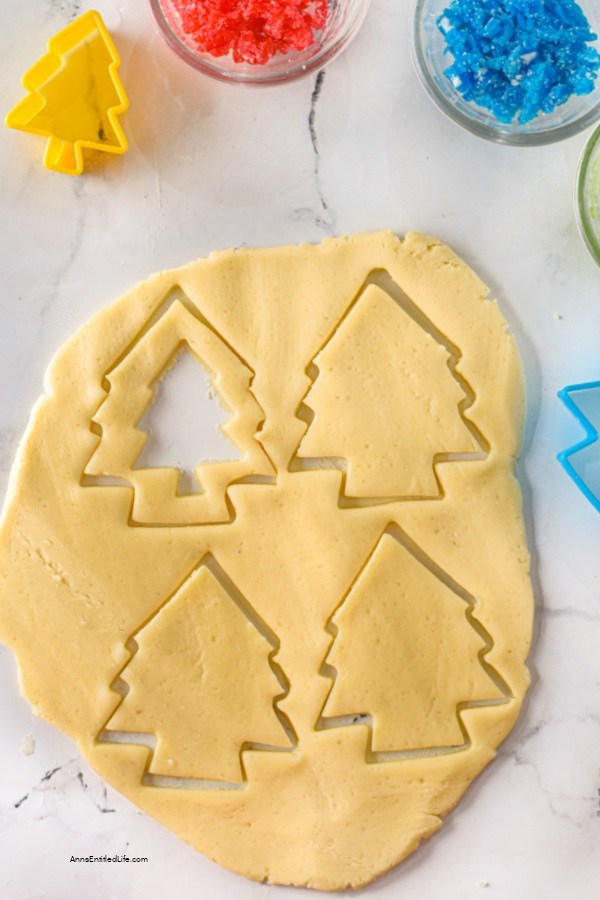 Stained Glass Cookies Recipe. Delicious and crisp sugar cookies are cut into shapes and filled with hard candies, which give a beautiful stained-glass effect after they are baked. These cookies are easy to make and look gorgeous. A delightful, simple, and mouthwatering treat to add to your Christmas cookies list.