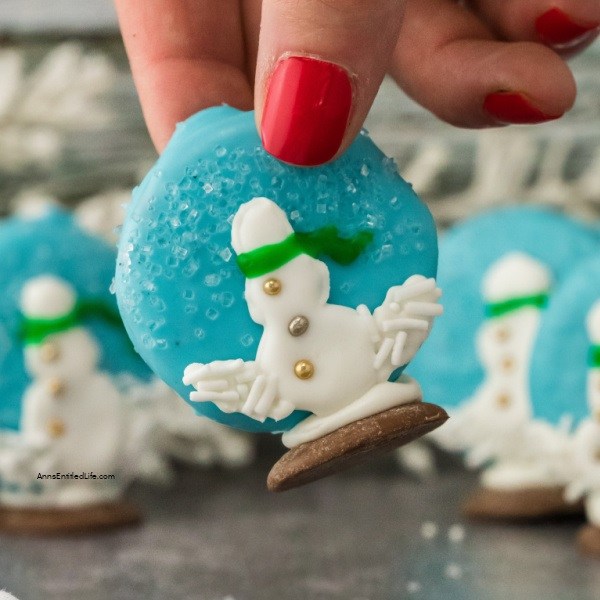 Easy Snow Globe Cookies Recipe. These easy-to-make snow globe cookies are simply adorable. No muss, no fuss, these no-bake cookies are the perfect addition to your holiday Christmas tray.