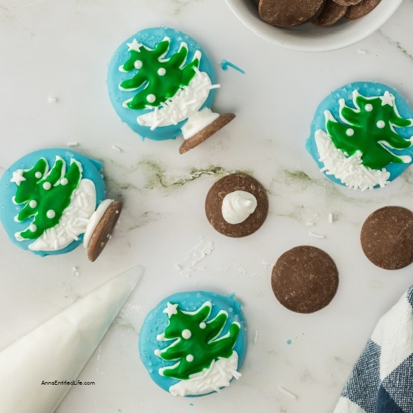 Easy Snow Globe Cookies Recipe. These easy-to-make snow globe cookies are simply adorable. No muss, no fuss, these no-bake cookies are the perfect addition to your holiday Christmas tray.