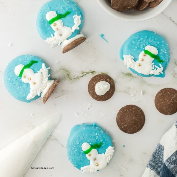 Easy Snow Globe Cookies Recipe. These easy-to-make snow globe cookies are simply adorable. No muss, no fuss, these no-bake cookies are the perfect addition to your holiday Christmas tray.