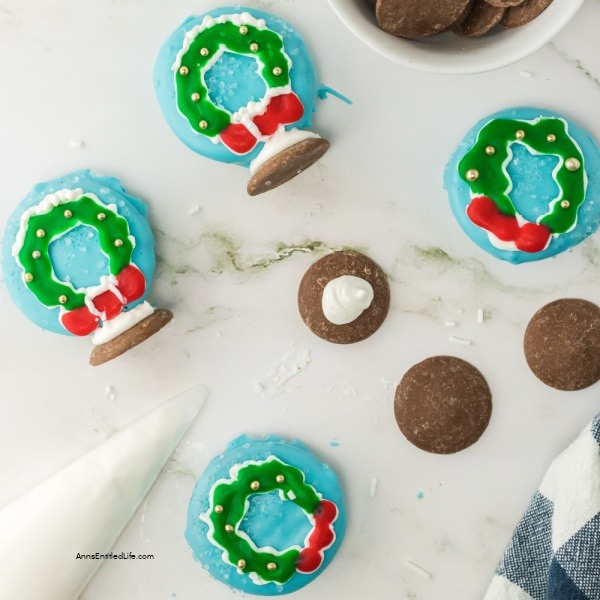 Easy Snow Globe Cookies Recipe. These easy-to-make snow globe cookies are simply adorable. No muss, no fuss, these no-bake cookies are the perfect addition to your holiday Christmas tray.