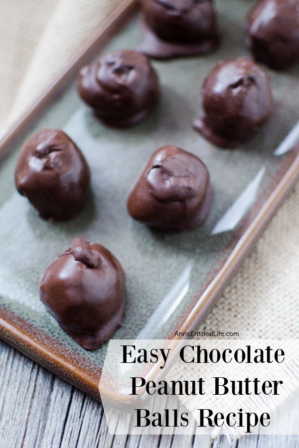 a blue tray filled with chocolate peanut butter balls