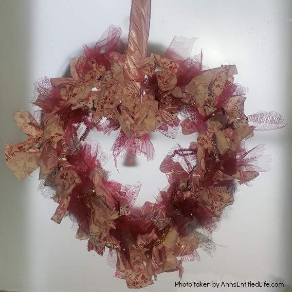 Valentine Heart Wreath DIY. This simple-to-make Valentine's Day wreath DIY is a dark front door craft. You don't have to be an experienced crafter to make this valentines wreath; simply follow the step-by-step instructions in this detailed tutorial to make this fun homemade wreath.