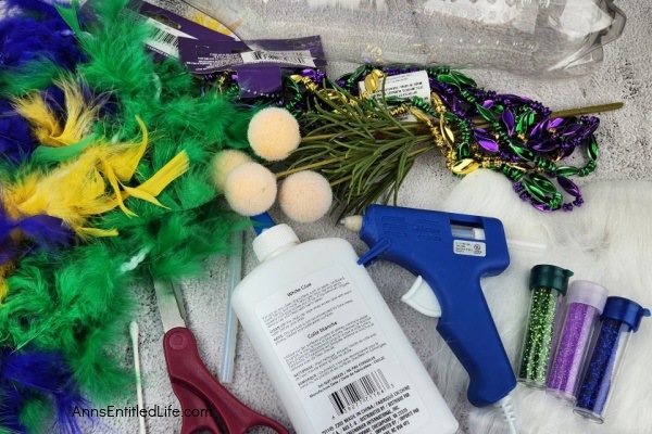 Mardi Gras Gnome DIY. Follow these simple step-by-step directions to make this fabulous Mardi Gras gnome! Perfect for Mardi Gras decorations and inexpensive to make, these flamboyant gnomes are terrific Mardi Gras decor.