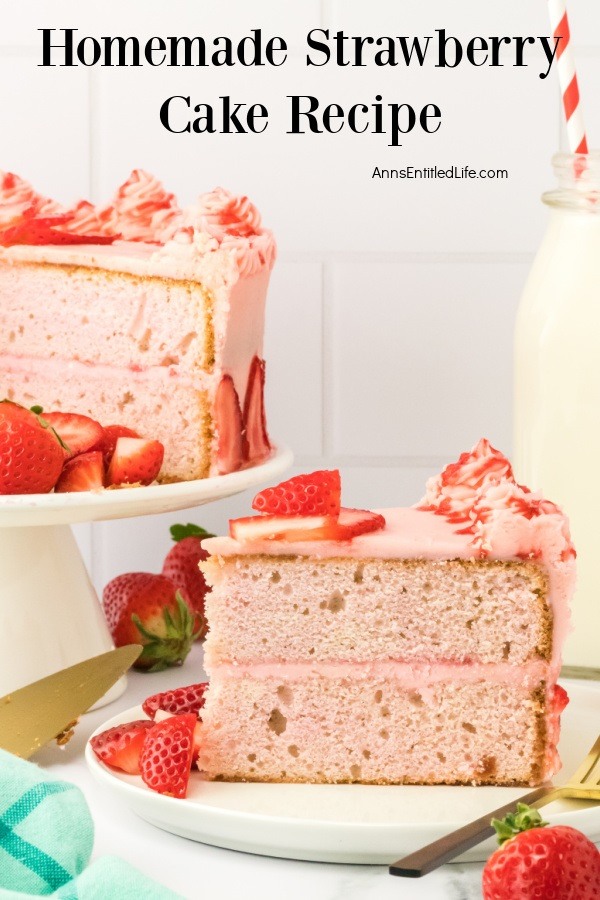 A piece of strawberry cake is on a white plate. The rest of the strawberry cake is on a white cake stand on the left, a bottle of white milk is on the right.