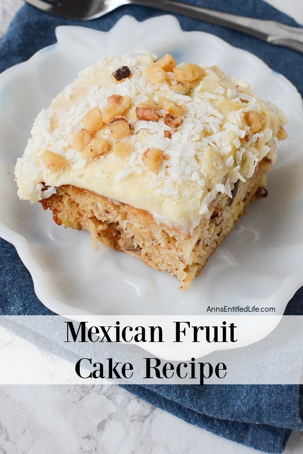 A piece of Mexican fruit cake on a white plate