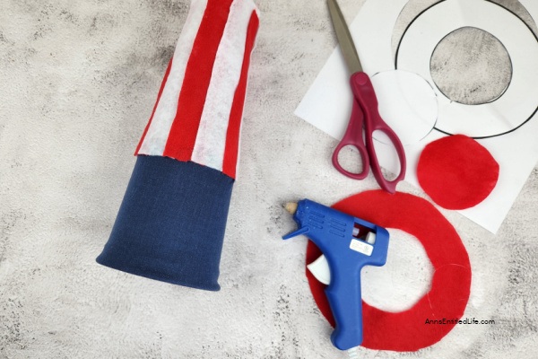 Patriotic Gnome Decor DIY - Great for the 4th of July. This adorable Uncle Same Gnome is the perfect Patriotic Gnome Decor you can make yourself. Great for the 4th of July, Memorial Day, Veteran's Day, or any other United States patriotic holiday, this little gnome craft is easy-to-make and comes together quickly.