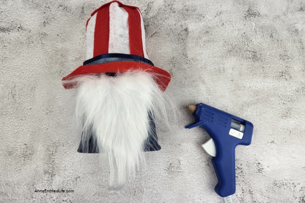 Patriotic Gnome Decor DIY - Great for the 4th of July. This adorable Uncle Same Gnome is the perfect Patriotic Gnome Decor you can make yourself. Great for the 4th of July, Memorial Day, Veteran's Day, or any other United States patriotic holiday, this little gnome craft is easy-to-make and comes together quickly.