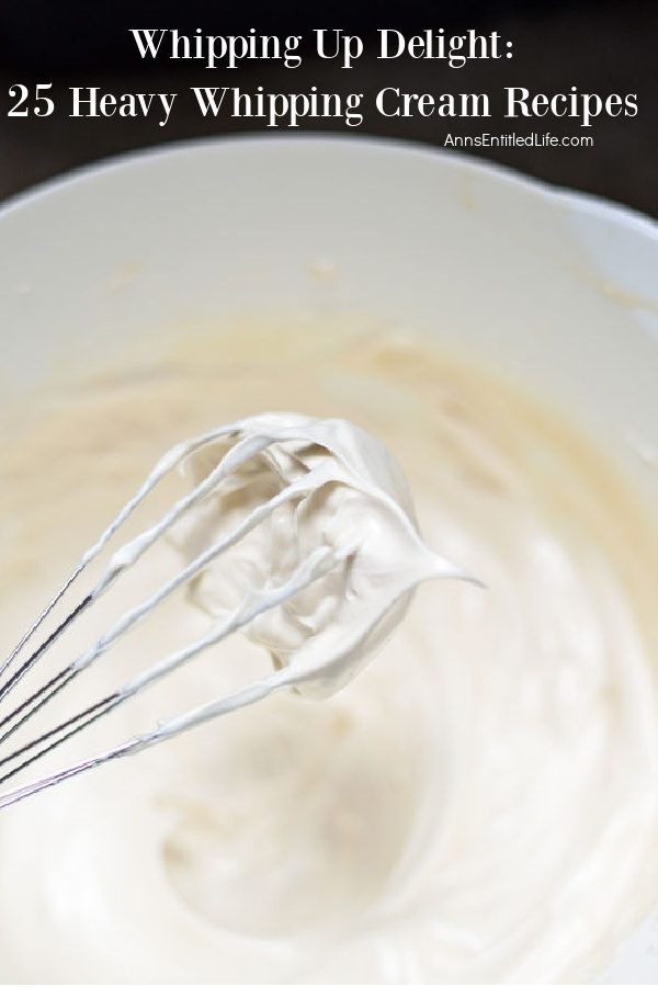 whipped cream clinging to a whisk with the rest of the whipped cream in a white bowl underneath.