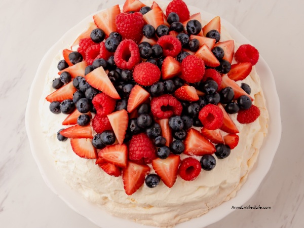 Red, White, and Blue Pavlova Recipe. Red, white, and blue pavlova is a classic dessert that is perfect for any occasion. It features a meringue base, topped with fluffy whipped cream, and fresh berries. This patriotic-themed treat looks stunning and tastes even better!