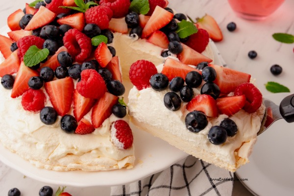 Red, White, and Blue Pavlova Recipe. Red, white, and blue pavlova is a classic dessert that is perfect for any occasion. It features a meringue base, topped with fluffy whipped cream, and fresh berries. This patriotic-themed treat looks stunning and tastes even better!