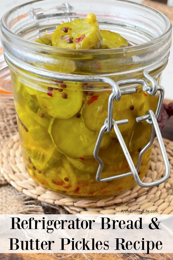 a jar of homemade bread and butter pickles sitting on top of a rattan hotpad