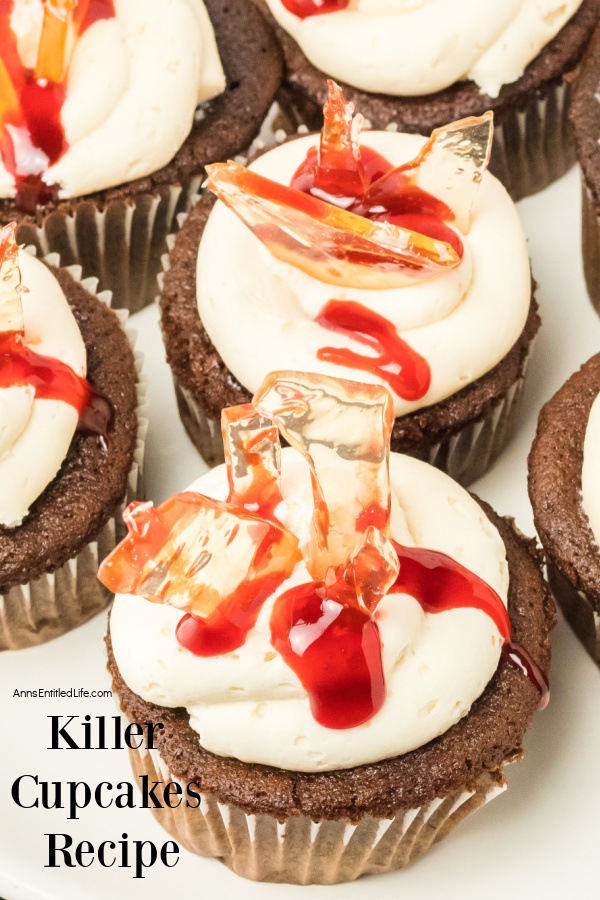 slightly ovehead view of killer cupcakes on a white surface