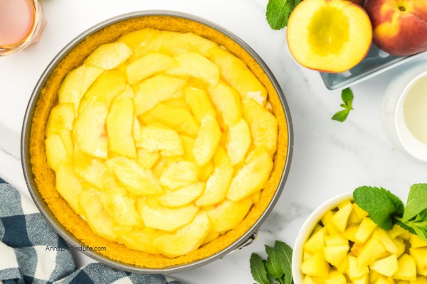 Fresh and Easy Peach Rum Cheesecake Recipe. Dive into a slice of paradise with this delightful peach rum cheesecake recipe. Experience the tantalizing blend of juicy peaches, creamy cheesecake, and a touch of rum. Prepare to be swept away by the flavors and taste of this heavenly dessert.