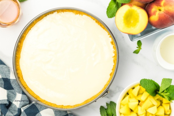 Fresh and Easy Peach Rum Cheesecake Recipe. Dive into a slice of paradise with this delightful peach rum cheesecake recipe. Experience the tantalizing blend of juicy peaches, creamy cheesecake, and a touch of rum. Prepare to be swept away by the flavors and taste of this heavenly dessert.