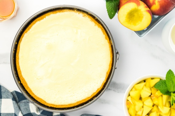 Fresh and Easy Peach Rum Cheesecake Recipe. Dive into a slice of paradise with this delightful peach rum cheesecake recipe. Experience the tantalizing blend of juicy peaches, creamy cheesecake, and a touch of rum. Prepare to be swept away by the flavors and taste of this heavenly dessert.