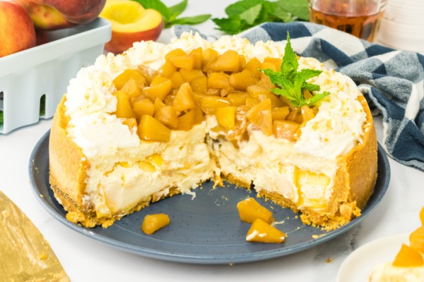 Fresh and Easy Peach Rum Cheesecake Recipe. Dive into a slice of paradise with this delightful peach rum cheesecake recipe. Experience the tantalizing blend of juicy peaches, creamy cheesecake, and a touch of rum. Prepare to be swept away by the flavors and taste of this heavenly dessert.