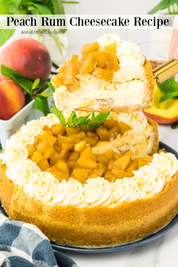 A piece of peach rum cheesecake being lifted on a pie lift. There are a few fresh peaches in the upper right and left.