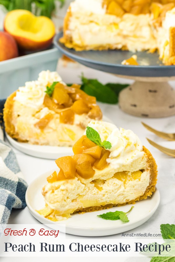 Single servings of two pieces of peach rum cheesecake on a white plates. There are a few fresh peaches in the upper left, the remaining cheesecake is in the upper right.