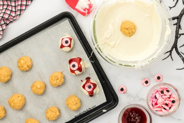 No-Bake Peanut Butter Eyeballs Halloween Treats. Whip up these frightfully delicious no-bake peanut butter eyeball Halloween treats for a spooky celebration. Easy recipe for a ghoulish delight.