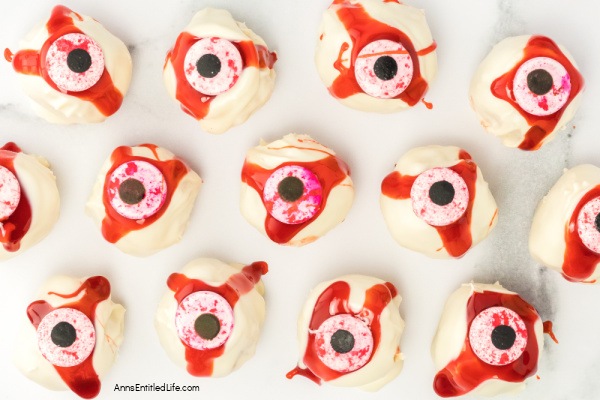 No-Bake Peanut Butter Eyeballs Halloween Treats. Whip up these frightfully delicious no-bake peanut butter eyeball Halloween treats for a spooky celebration. Easy recipe for a ghoulish delight.