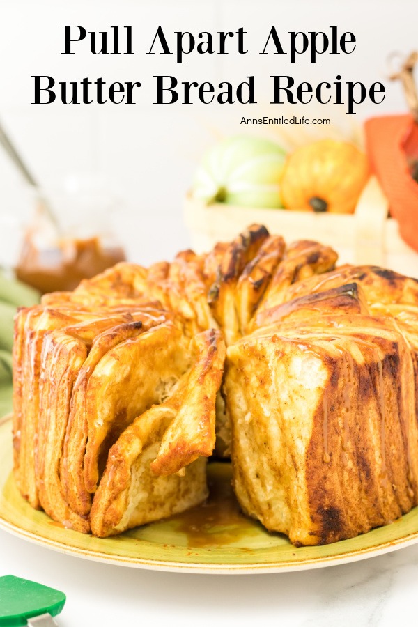 Side view of a pull-apart apple butter bread on a green plate.