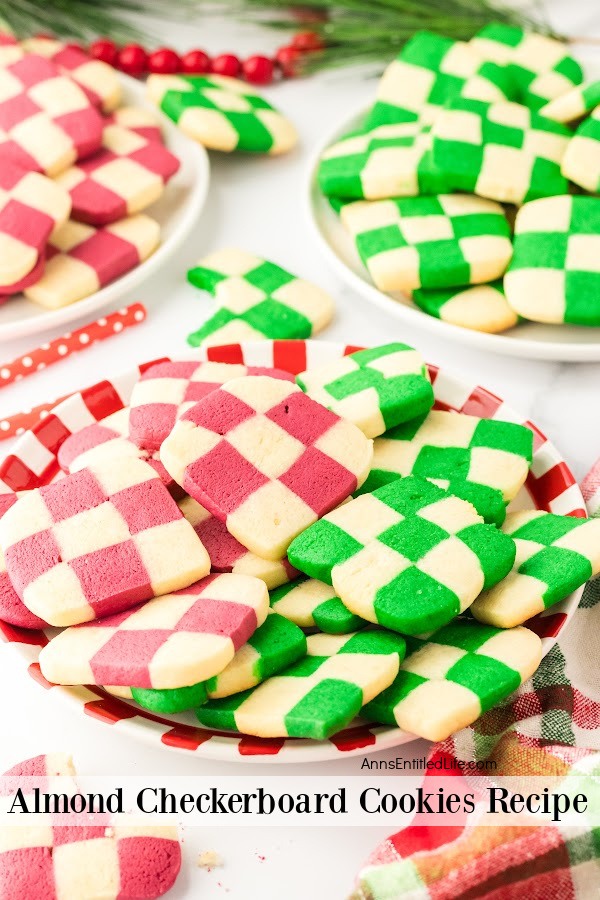 Plates of red and white and green and white checkerboard cookies.