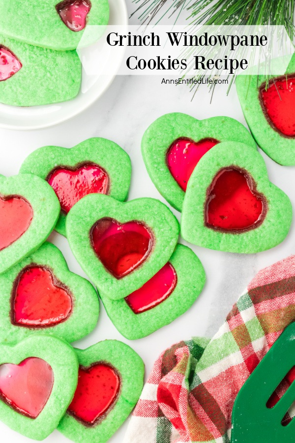 Green windowpane cookies on a white surface