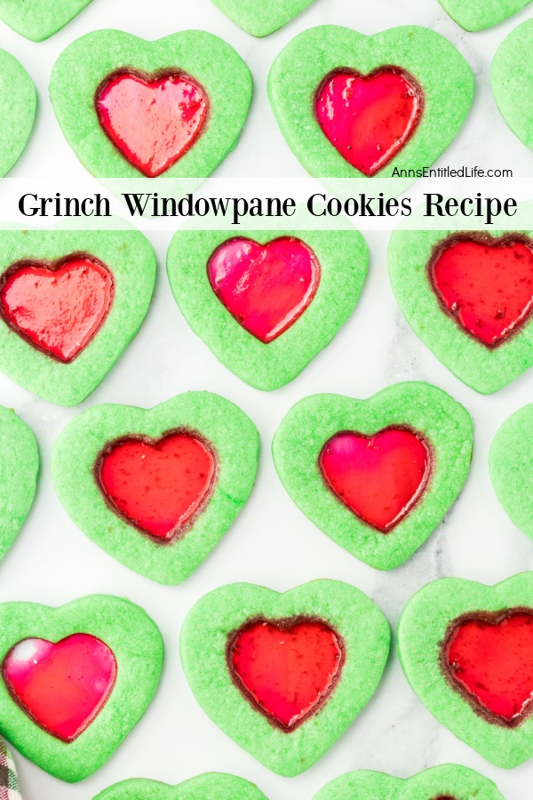 Green windowpane cookies on a white surface