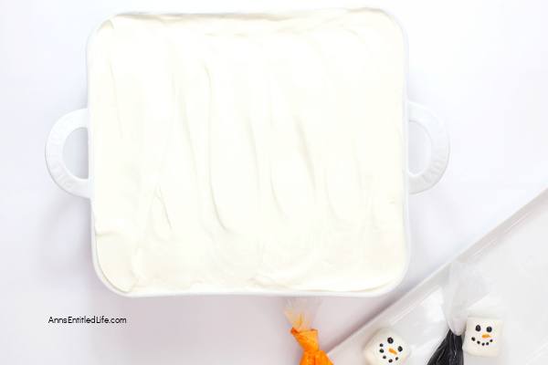 No-Bake Melted Snowman Cake Recipe | How to Make. This no-bake melted snowman lush dessert is a sweet, creamy winter wonderland of flavors. This cake is a combination of cheesecake and pudding and tastes marvelous.