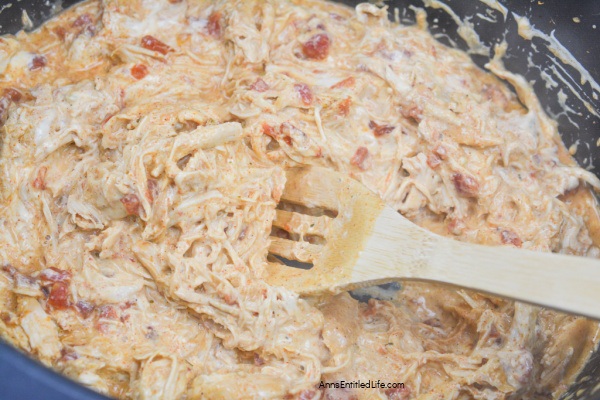 Easy Slow Cooker Queso Chicken Recipe | Great for Tacos. Spice up your meals with this delicious slow cooker queso chicken recipe. Perfect for family dinners and gatherings.