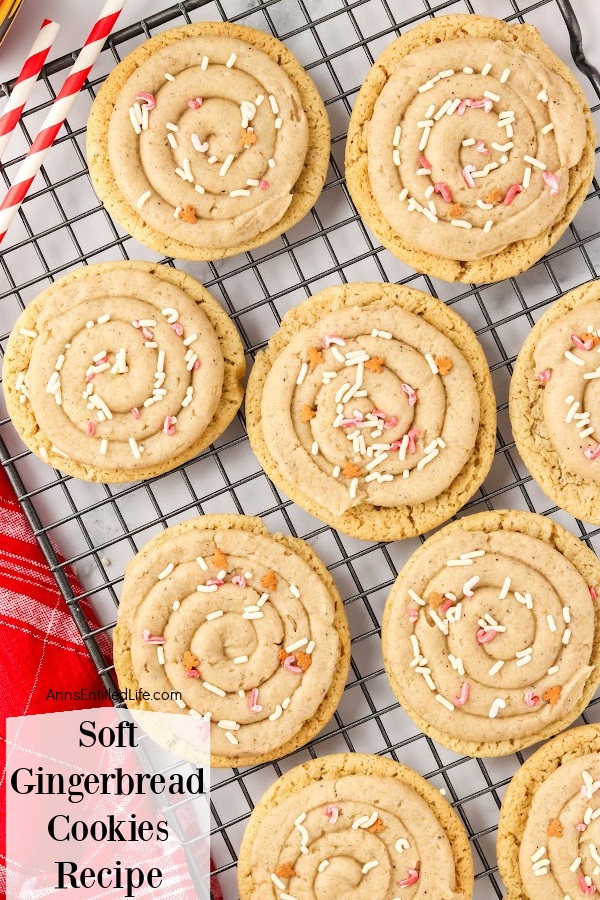 Wire rack filled with frosted soft gingerbread cookies