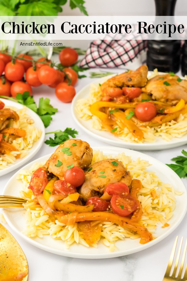 White plates filled with chicken cacciatore. There are tomatoes in the upper left, a plate of orzo in the upper right.