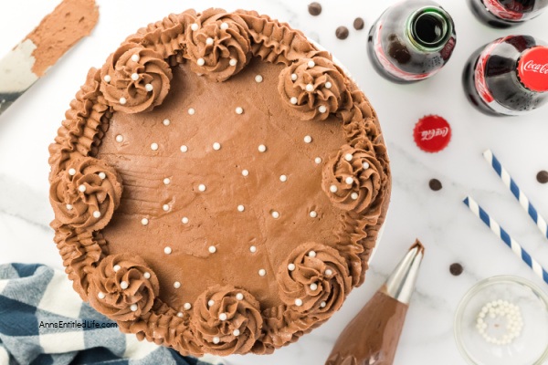 Coca-Cola Cake Recipe | Best Chocolate Coke Layer Cake. This moist and delicious Coca-Cola cake is a Southern classic. A decadent chocolate cake with rich chocolate frosting, it is the perfect dessert for celebrations or potlucks!